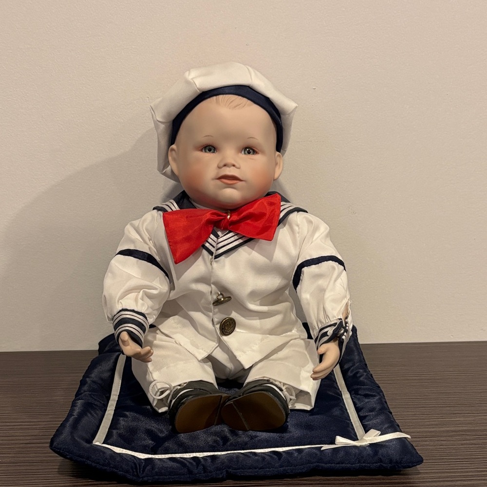 Porcelain Sailor Doll with Red Bow